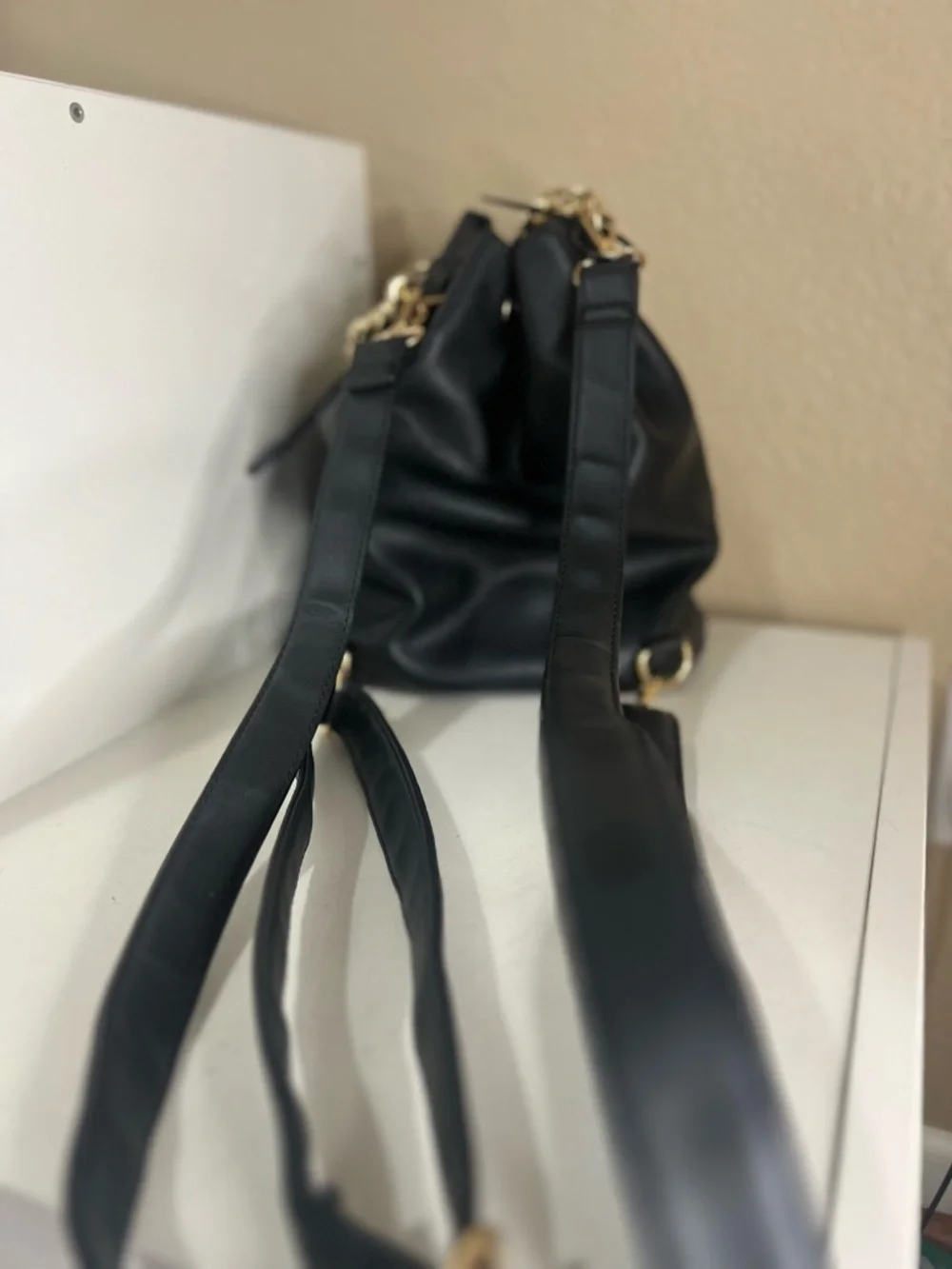 Grossi Black Faux Leather Mini Backpack Drawstring Bucket Bag Gold Chain